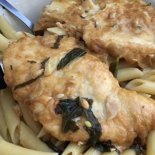 Chicken parmesan over pasta
